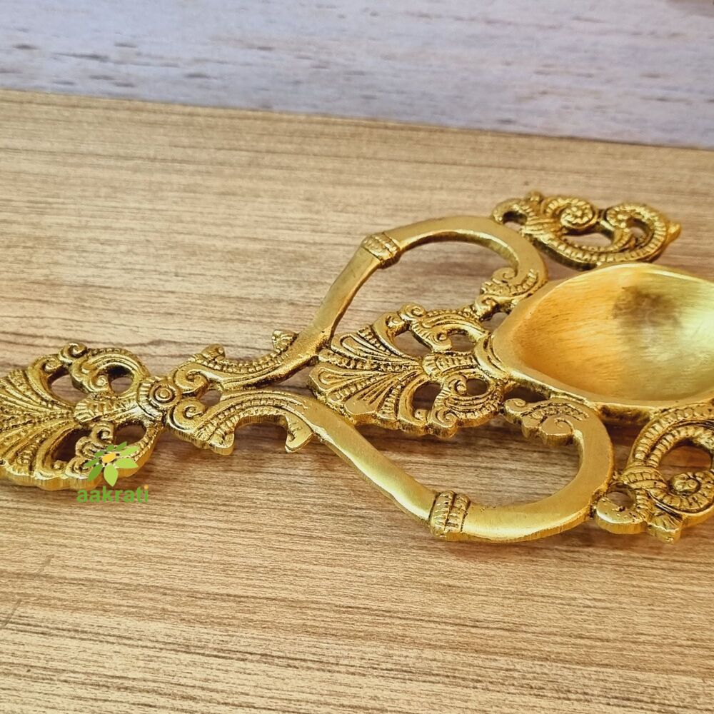 aakrati Spoon with Peacock Design Hand Carved Brass Spoon For Home Decoration Brass Table Diya  (Height: 4.4 inch)