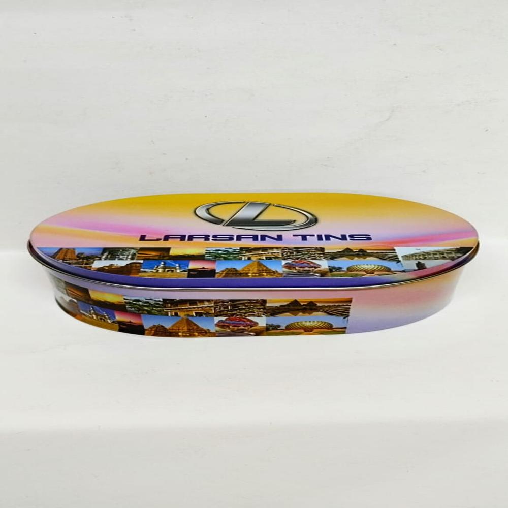 Oval Shape Chocolate Tin Box - Color: Multicolour