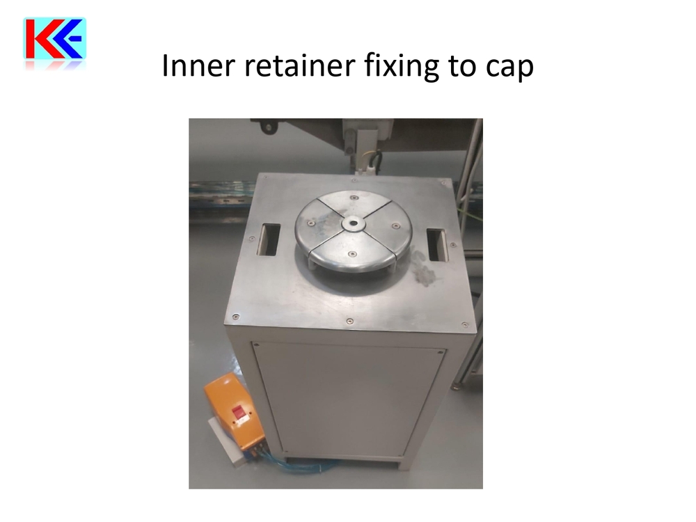 Inner retainer fixing to cap Machine