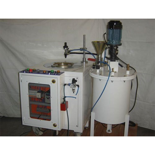 ADHESIVE DISPENSER WITH TURN TABLE