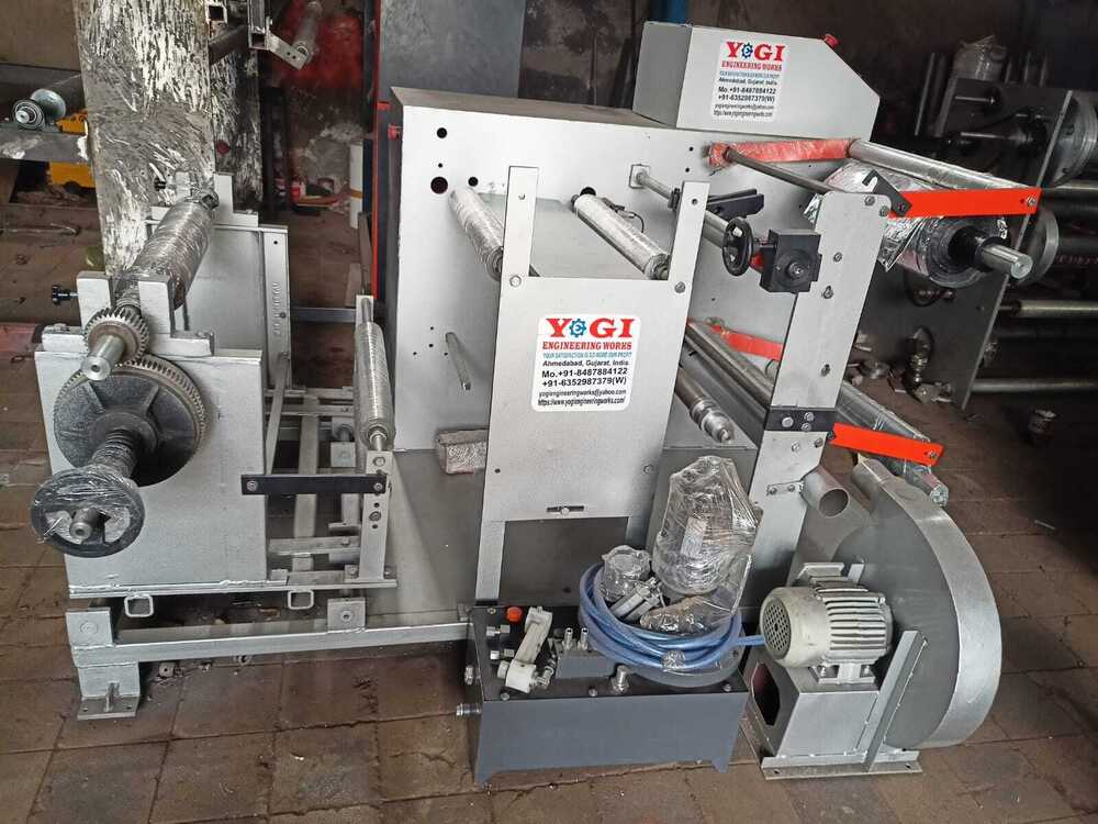 Doctoring Cum Slitting Winding Machine