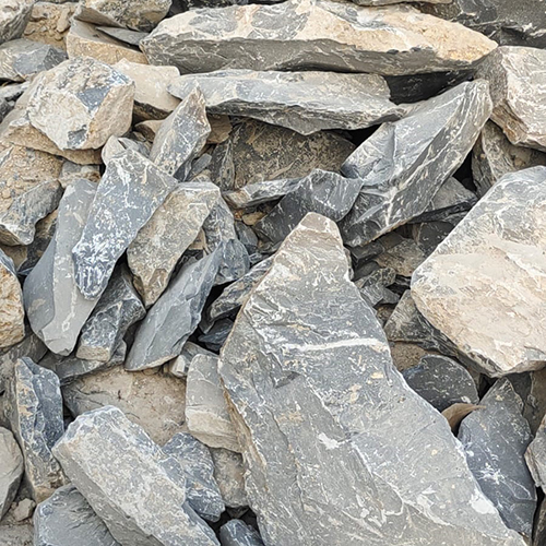 Grey Limestone Lumps - High-Strength Basic Refractory Material | Reversible Dimensional Stability, Available in Multiple Shapes, Ideal for High-Temperature Industrial Applications