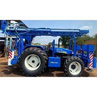 Tractor attachment piling Machine