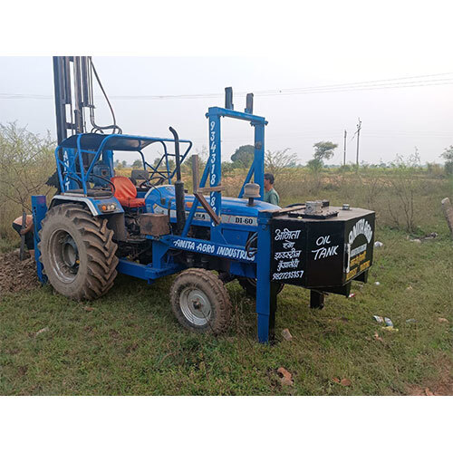 Tractor attachment piling machine