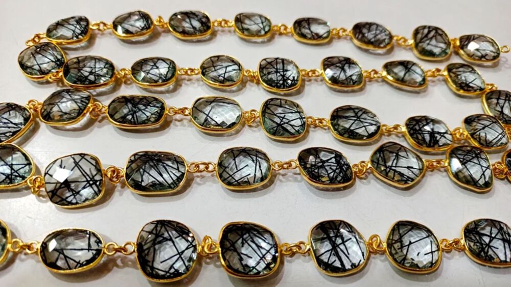 Black Rutilated Quartz Briolette chain .