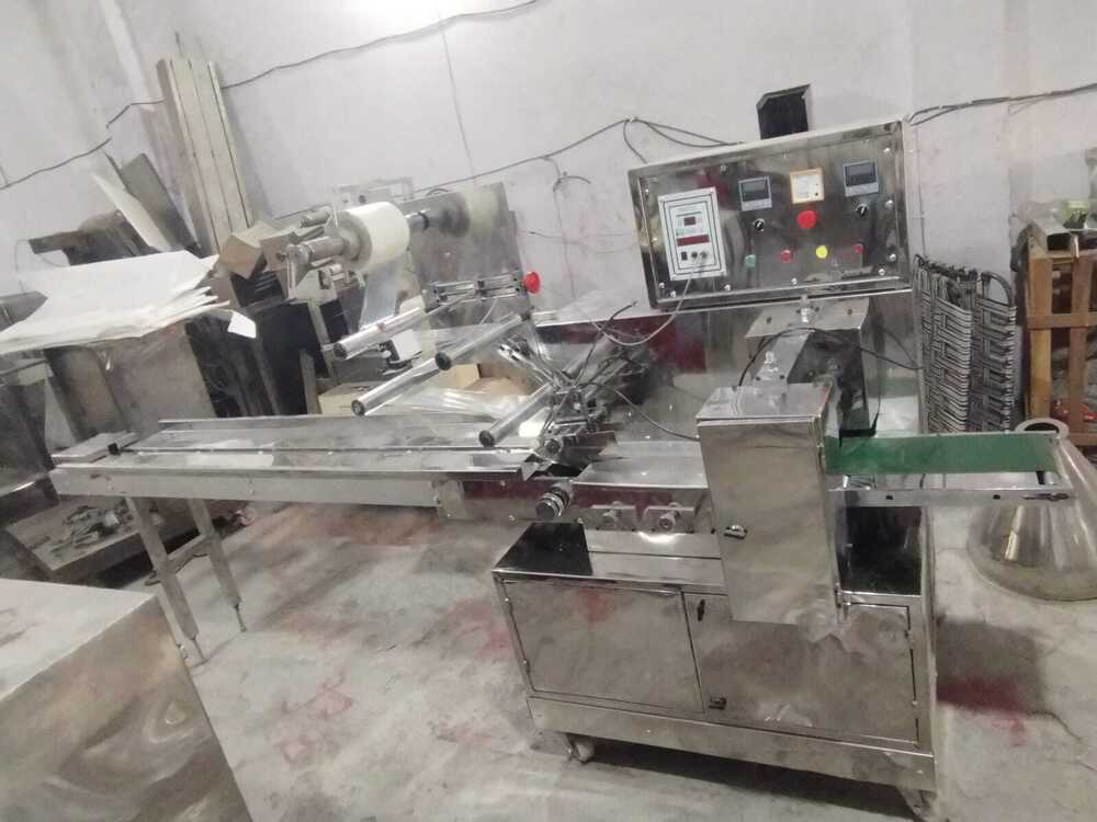 Horizontal flow wrap ice cream packing machine