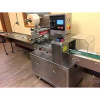 Biscuit Packaging Machine - Stainless Steel, Electric Drive 220-440 Volt , Automatic With Human Machine Interface Control, Highly Efficient