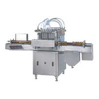 Automatic Volumetric Liquid Filling Machine - Stainless Steel, 200 To 3000 Bottles/hour, 440 Volt | High Performance, Plc Control, Electric Drive, 1-year Warranty