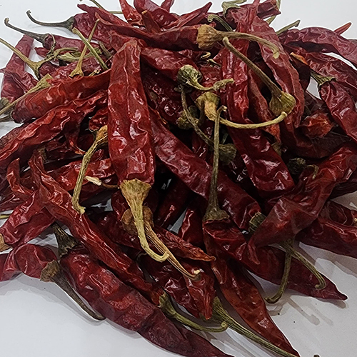 Red Pepper - Food Grade Quality, Brown Color, Ideal for Flavor Enhancement in Food Dishes, Stored in Dry Place, Available in Custom Weights