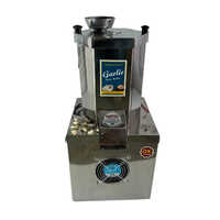 GARLIC PEELING MACHINE