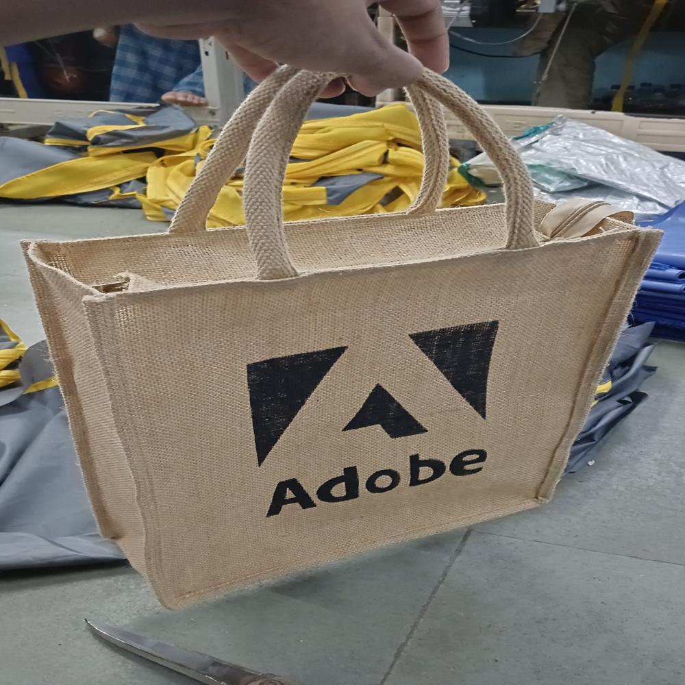 Eco Friendly Jute Bag - Natural Jute Material, Various Sizes Available, Customizable Design, Comfortable Flexiloop Handle | Ideal For Shopping And Promotions