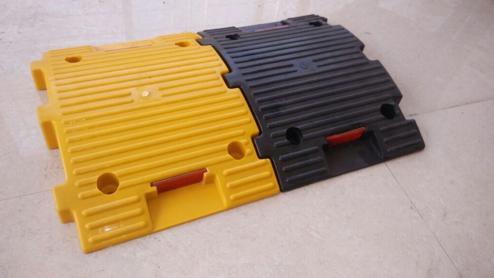 Concrete Filled Plastic Speed Breaker - Color: Black & Yellow