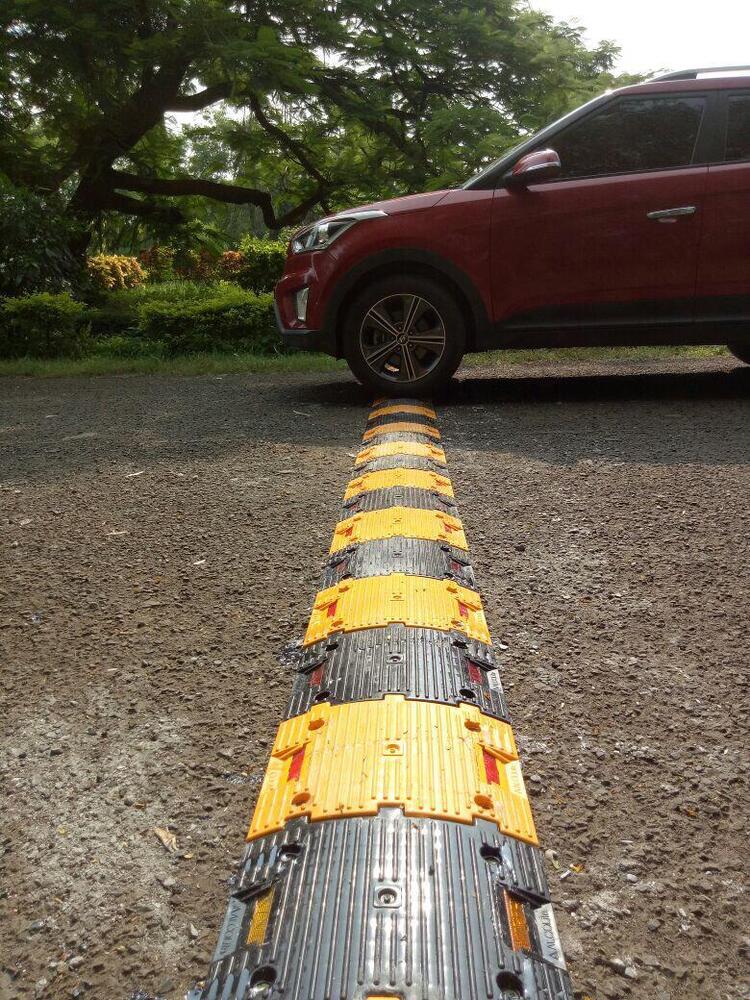 Concrete Filled Plastic Speed Breaker - Color: Black & Yellow