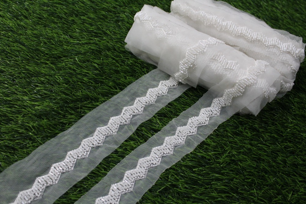 white cutdana lace