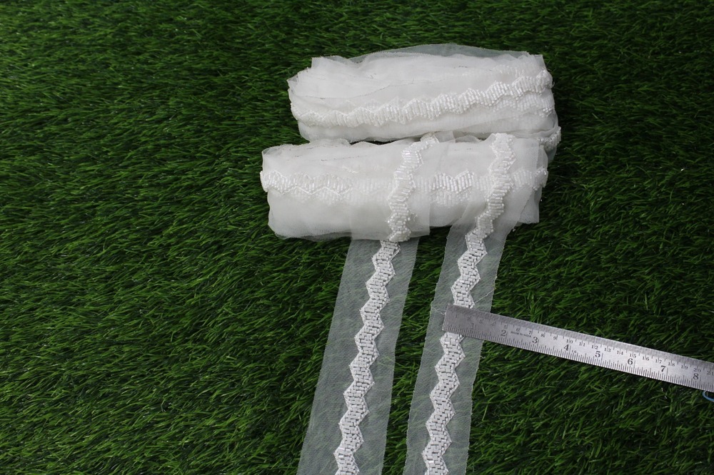 white cutdana lace