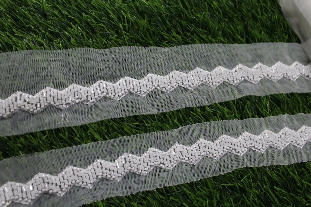 white cutdana lace
