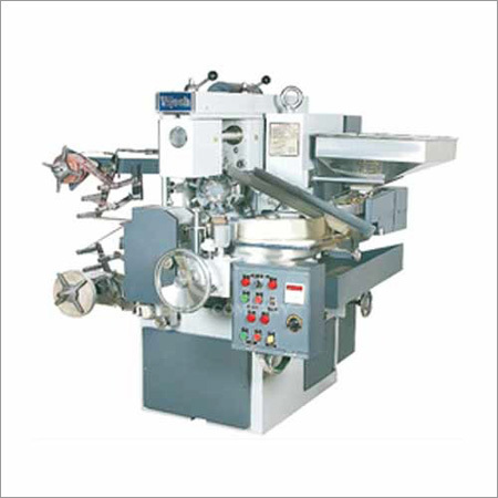 कैंडी डबल ट्विस्ट रैपिंग मशीन