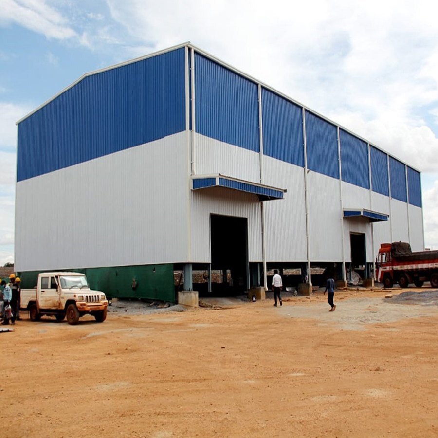 Factory Shed - Steel Structure, Yellow And White Color , Nut, Bolts, And Welding Connection, Metal Sheet Roof, Durable And Customizable