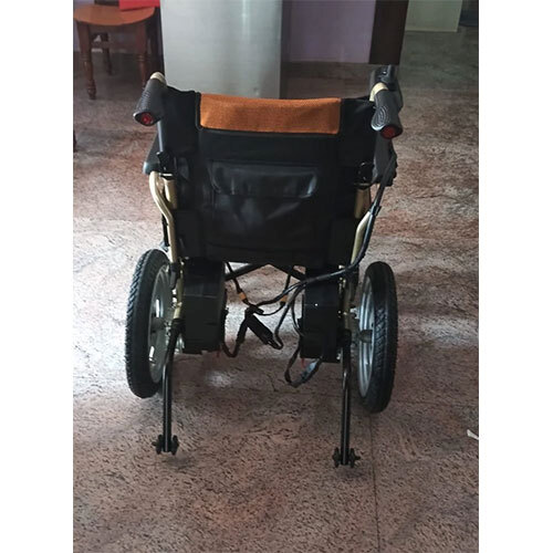 Brown Power Assist Wheel Chair