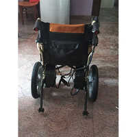 Brown Power Assist Wheel Chair