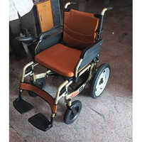 Brown Power Assist Wheel Chair