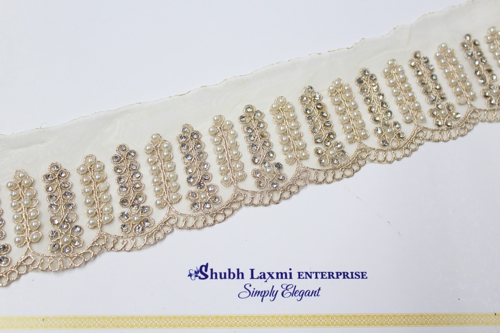 Designer golden  moti with stone lace