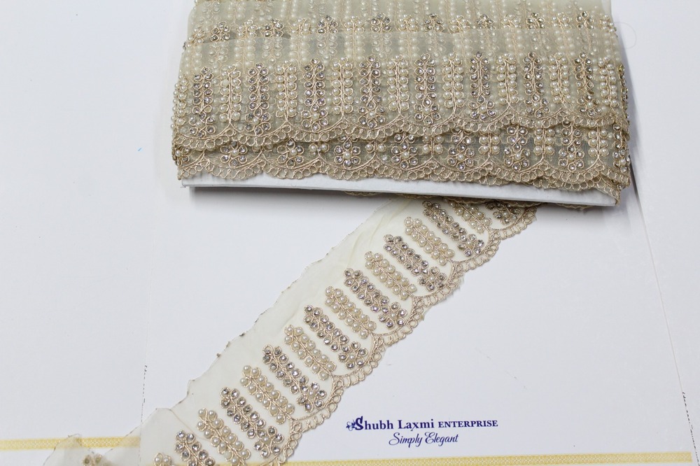 Designer golden  moti with stone lace