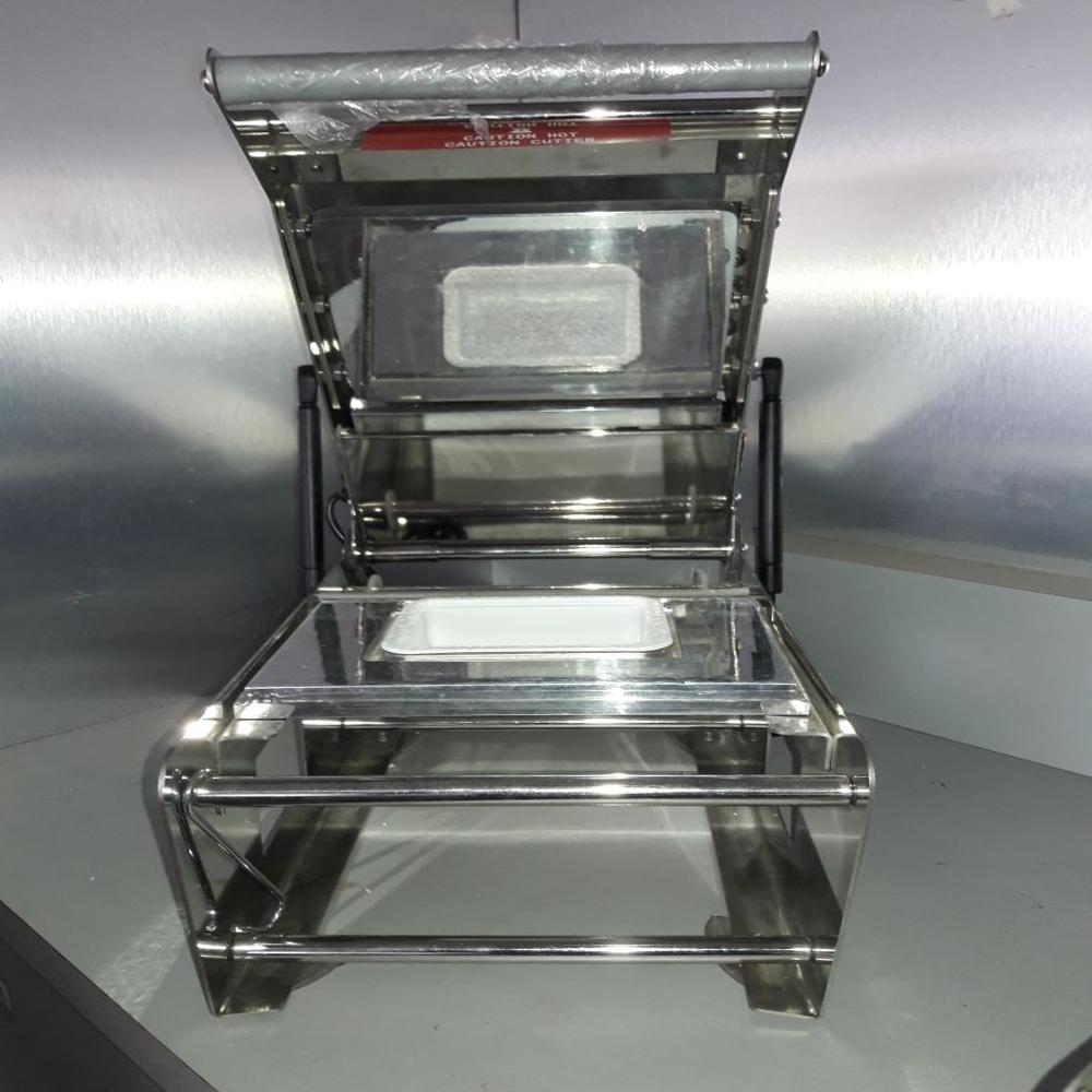 Container Tray Sealing Machine - 20 X 16 X 11 Inches , Silver Color, Semi Automatic, 200-250 Packs/hr
