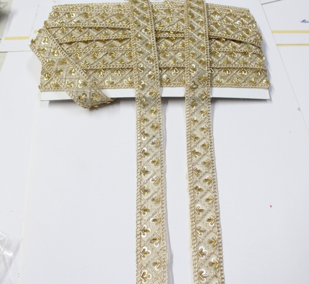 golden cutdana sequence lace