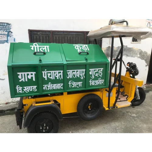 Heavy Loaded Garbage E Rickshaw