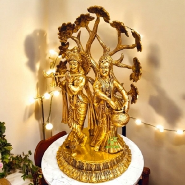 Aakrati Brass Radha Krishna with Tree | Antique Finish Sculpture | Radha Krishna Under Tree ( Yellow, 22 inch)