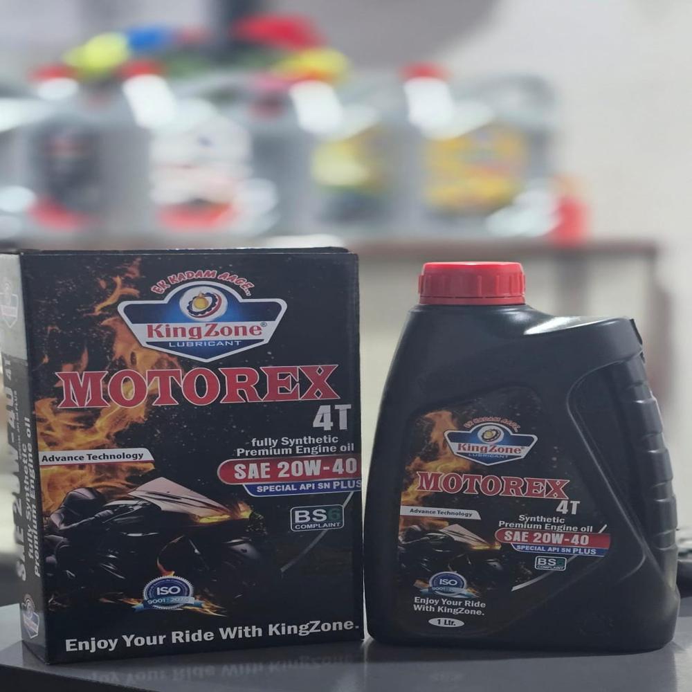 Motul Engine Oil - Color: Amber To Brown