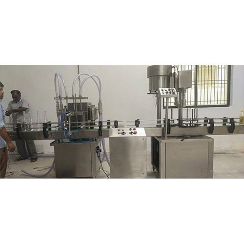 Automatic 4 Head Liquid Filling Machine