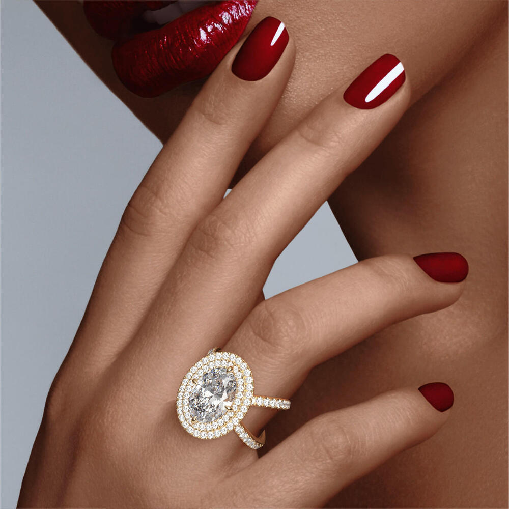 Oval Cut Diamond Engagement Ring With Double Halo In 18k Yellow Gold