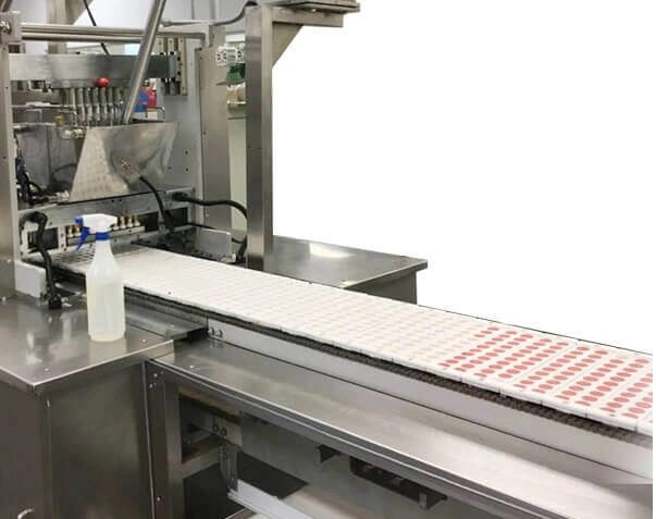 Gummy deposting machine