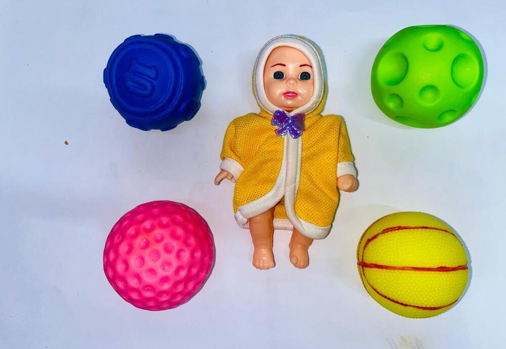 Baby Doll with 4 Fruit / balls Squeezy Toys