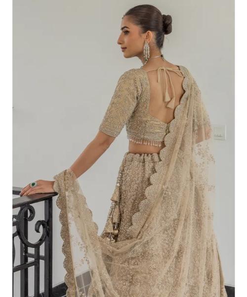 Beige net bridal lehenga choli