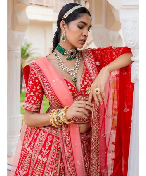 Bridal red silk lehenga choli with rich embellishment