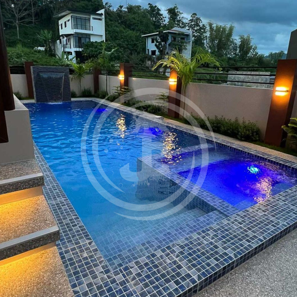 Rcc Swimming Pool - Crystal-Clear Rectangular Design | Smooth Stone Tile Borders, Refreshing Oasis for Inviting Relaxation Under Open Sky