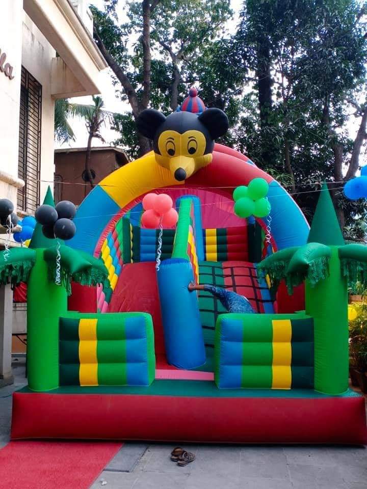 Inflatable Bouncy Castle Slide, Cartoon Characters Theme, Rainbow Colours, Kids Play Area - Age Group: Children