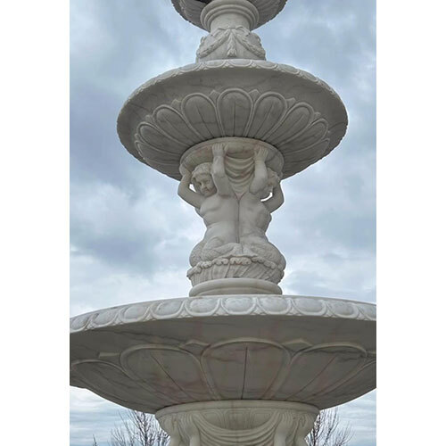 White stone statue water fountain