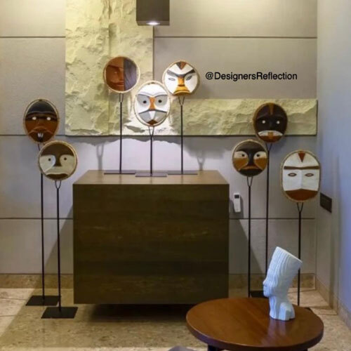 Standee With Faces In Wooden Carving