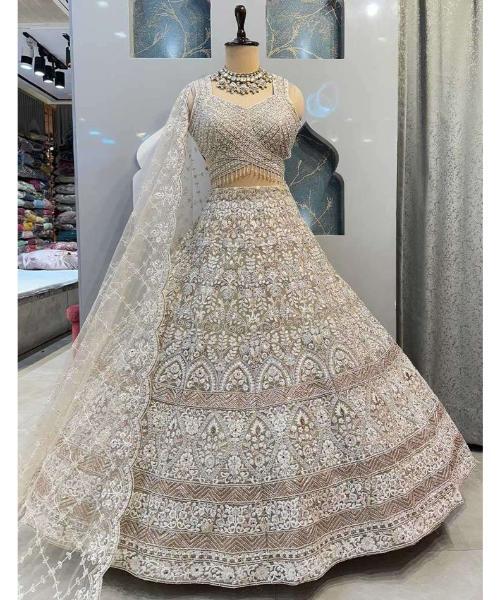 Off-white georgette lehenga choli with hand cut dana and sequins work