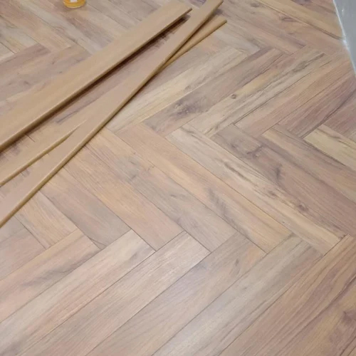 Brown Laminated Wooden Flooring - Oak Wood, 18mm Thickness, Rich Brown Color | Easy Installation, Matte Surface Treatment, Water Absorption