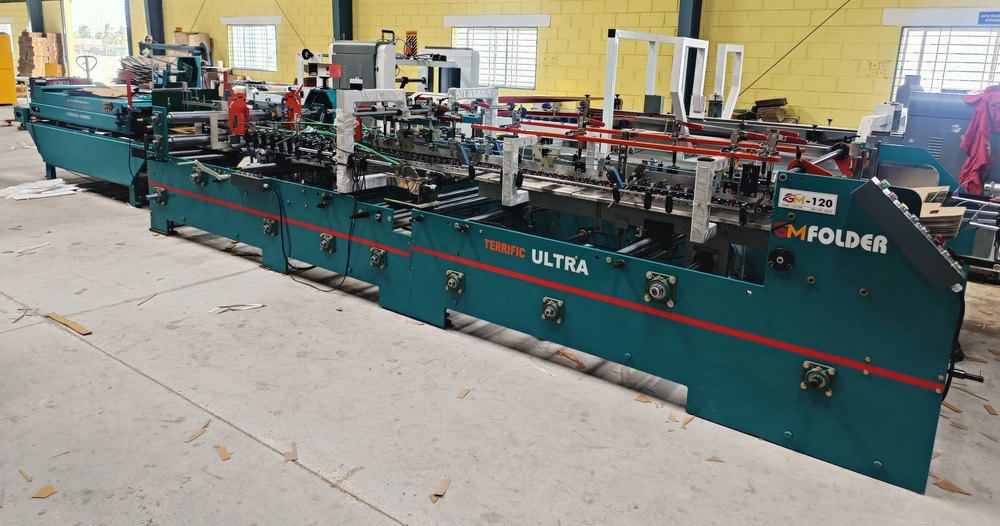 Automatic carton folding and gluing machine