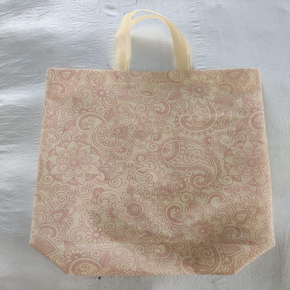 Non Woven Bag Making Machine - Non-woven Fabric Rolls, Roller Width 1.25m, Speed 40-120 Pcs/min, Pink And White Color, 1-year Warranty