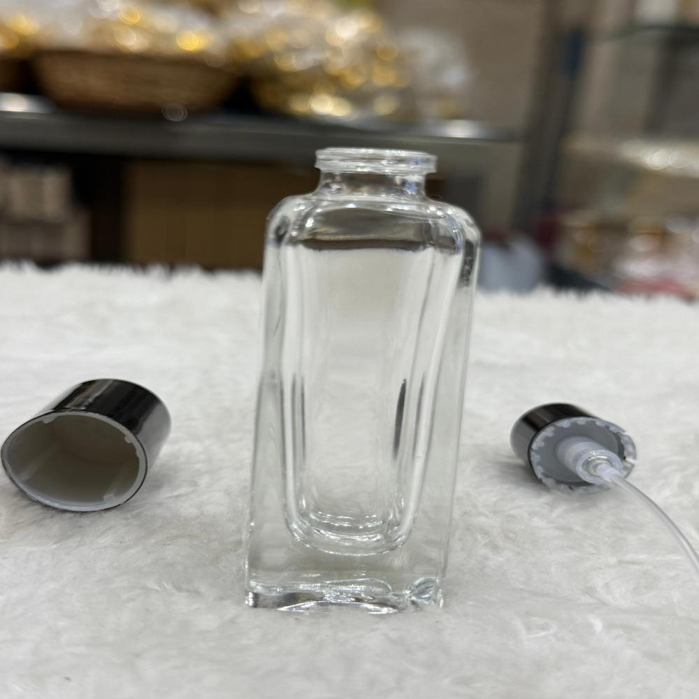 Perfume Bottle - Glass Material, Standard Size, Transparent Color | Eco-friendly Design, Smooth Finish, Water Resistant, Warranty Included