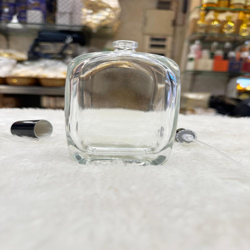 Perfume Bottle - Glass Material, Standard Size, Transparent Color | Eco-friendly Design, Smooth Finish, Water Resistant, Warranty Included