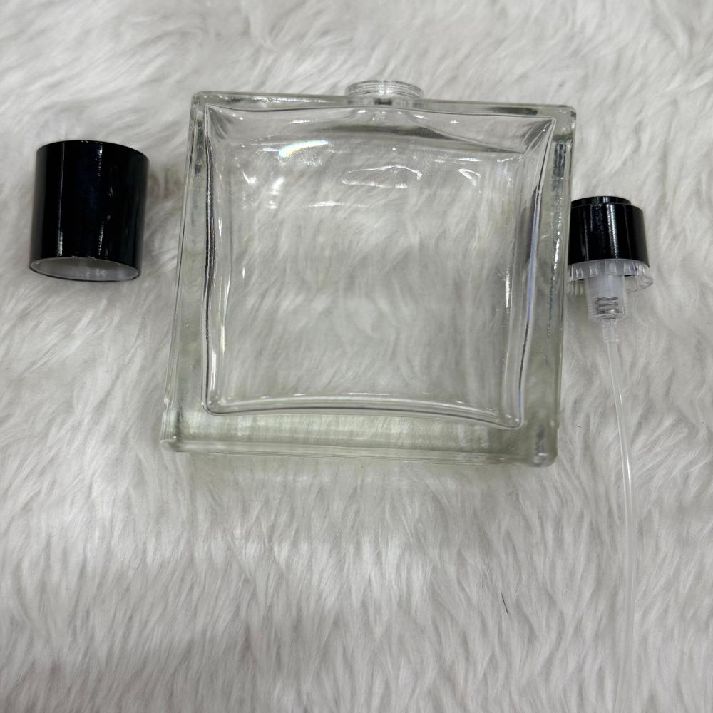 Perfume Bottle - Glass Material, Standard Size, Transparent Color | Eco-friendly Design, Smooth Finish, Water Resistant, Warranty Included