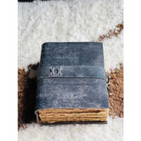 This Idrish Handicrafts Leather Bound Journal Strap Lock - Binding: Perfect Binding